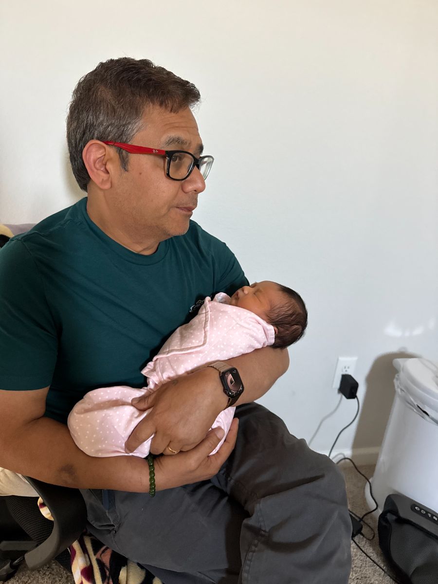 Welcoming granddaughter Gia Zenia